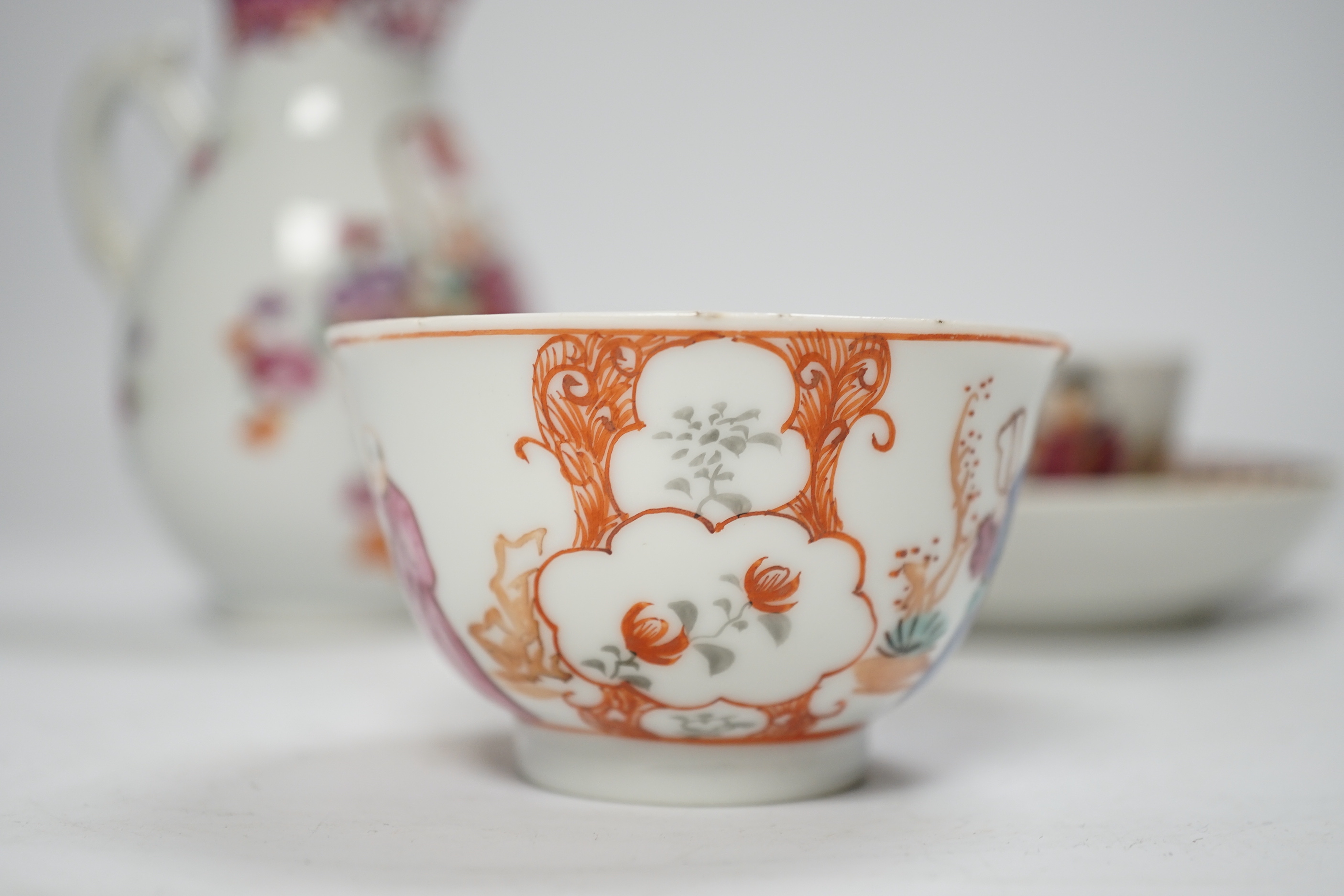 A Chinese Mandarin pattern milk jug and two similar tea bowls and a saucer, jug 14.5cm (4)